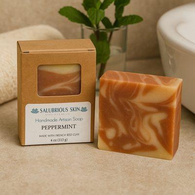 Handmade artisan soap with packaging on a bathroom counter